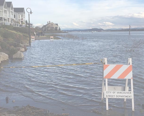 image of the Columbia River flooding along the waterfront