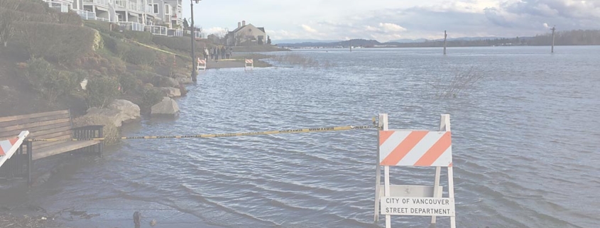 image of the Columbia River flooding along the waterfront